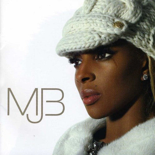 the album cover for Mary J. Blige - Reflections: A Retrospective