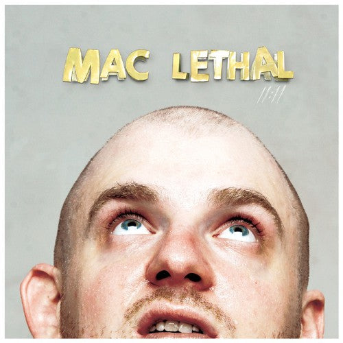 the album cover for Mac Lethal - 11:11
