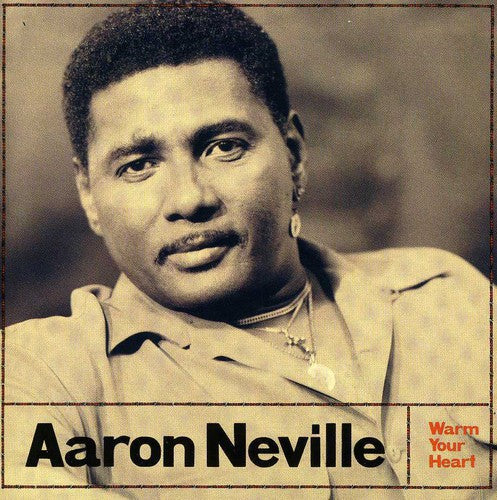 the album cover for Aaron Neville - Warm Your Heart