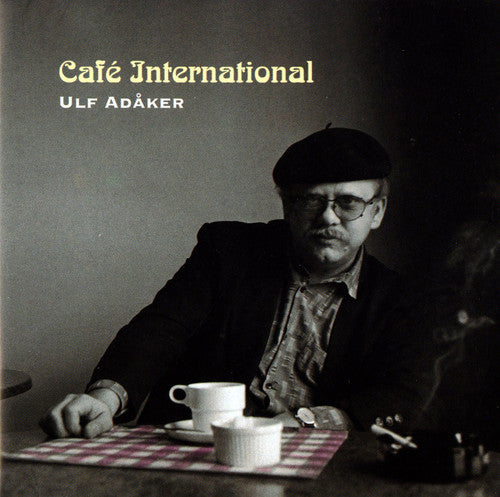 the album cover for Ulf Adåker - Cafe International