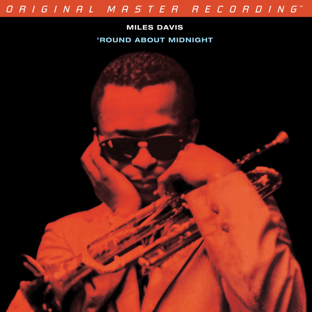 the album cover for Miles Davis - Round About Midnight