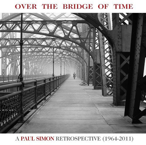the album cover for Paul Simon - Over The Bridge Of Time: A Paul Simon Retrospective