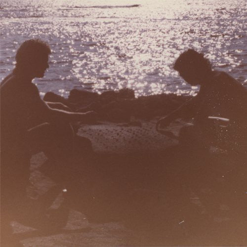 the album cover for Seahaven - Reverie Lagoon: Music for Escapism Only