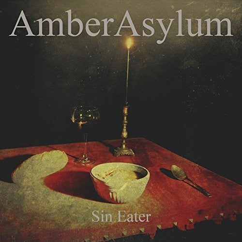 the album cover for Amber Asylum - Sin Eater