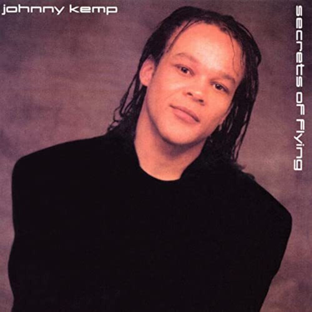 the album cover for Johnny Kemp - SECRET'S OF FLYING