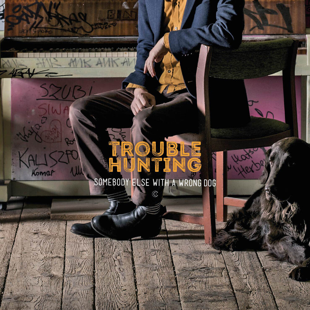 the album cover for Trouble Hunting - Somebody Else with a Wrong Dog