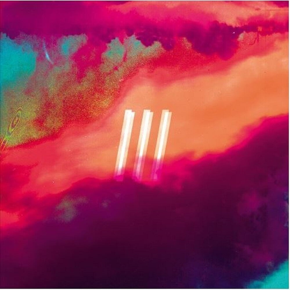 the album cover for Magic In Threes - Three