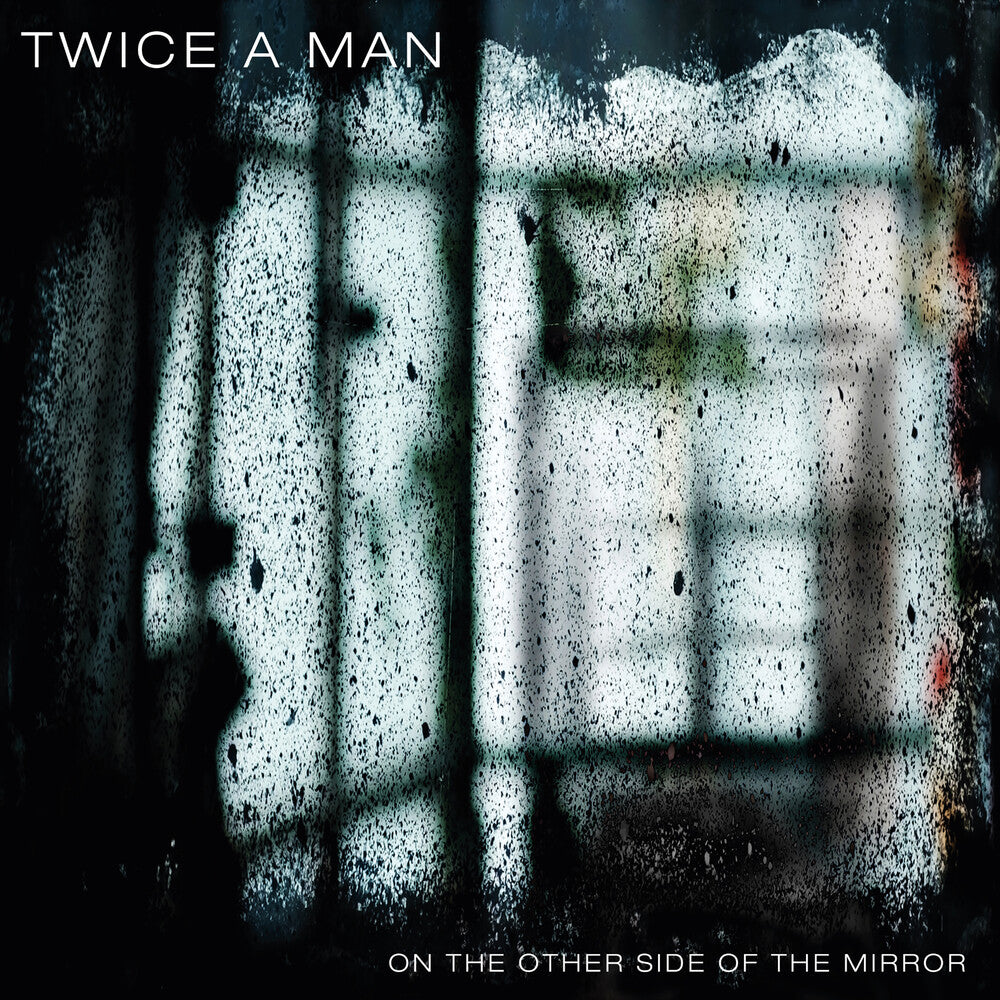the album cover for Twice A Man - On The Other Side Of The Mirror