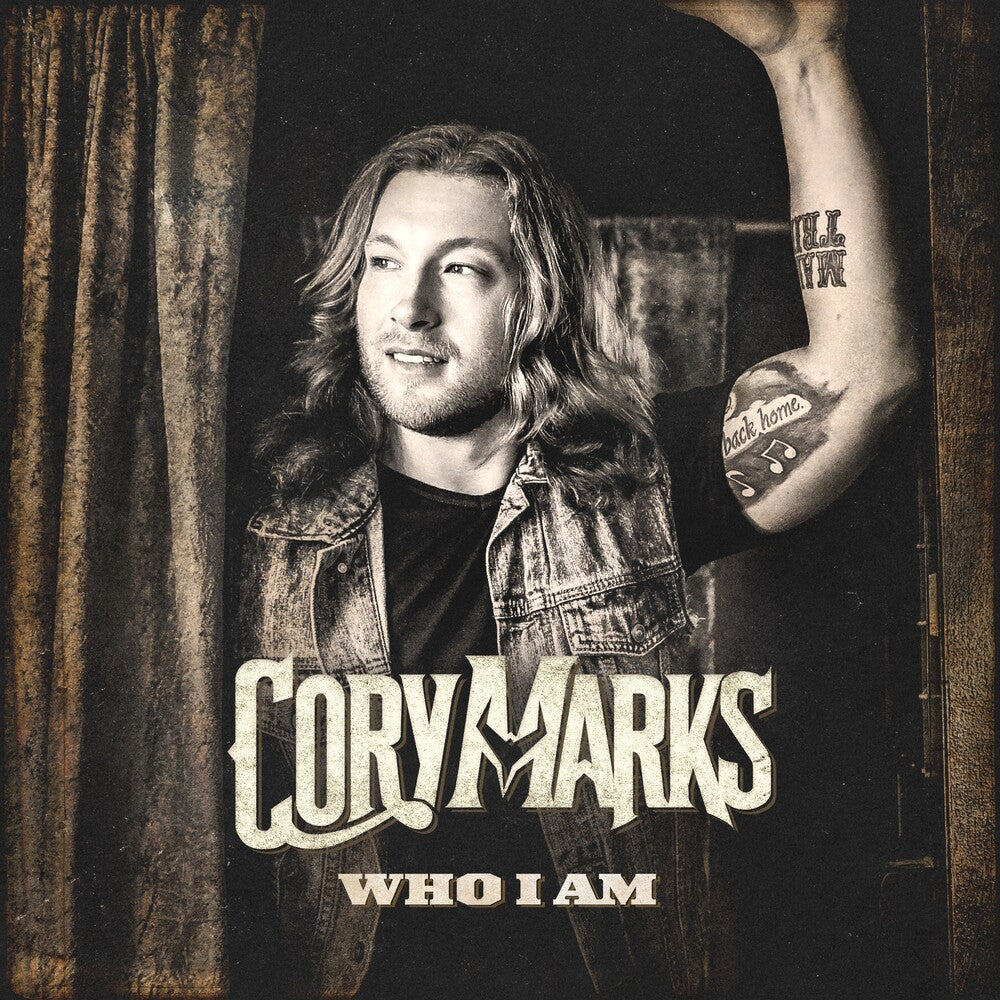 the album cover for Cory Marks - Who I Am