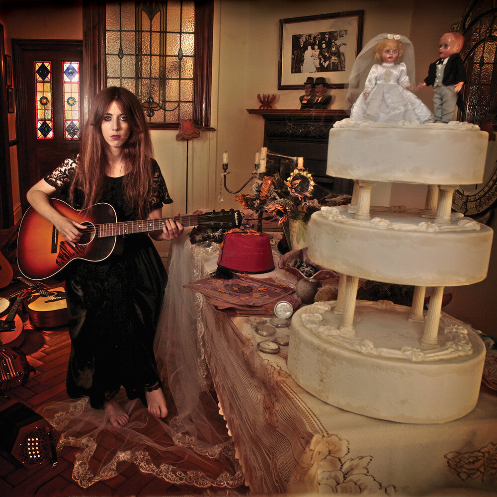 the album cover for Gwenifer Raymond - Strange Lights Over Garth Mountain