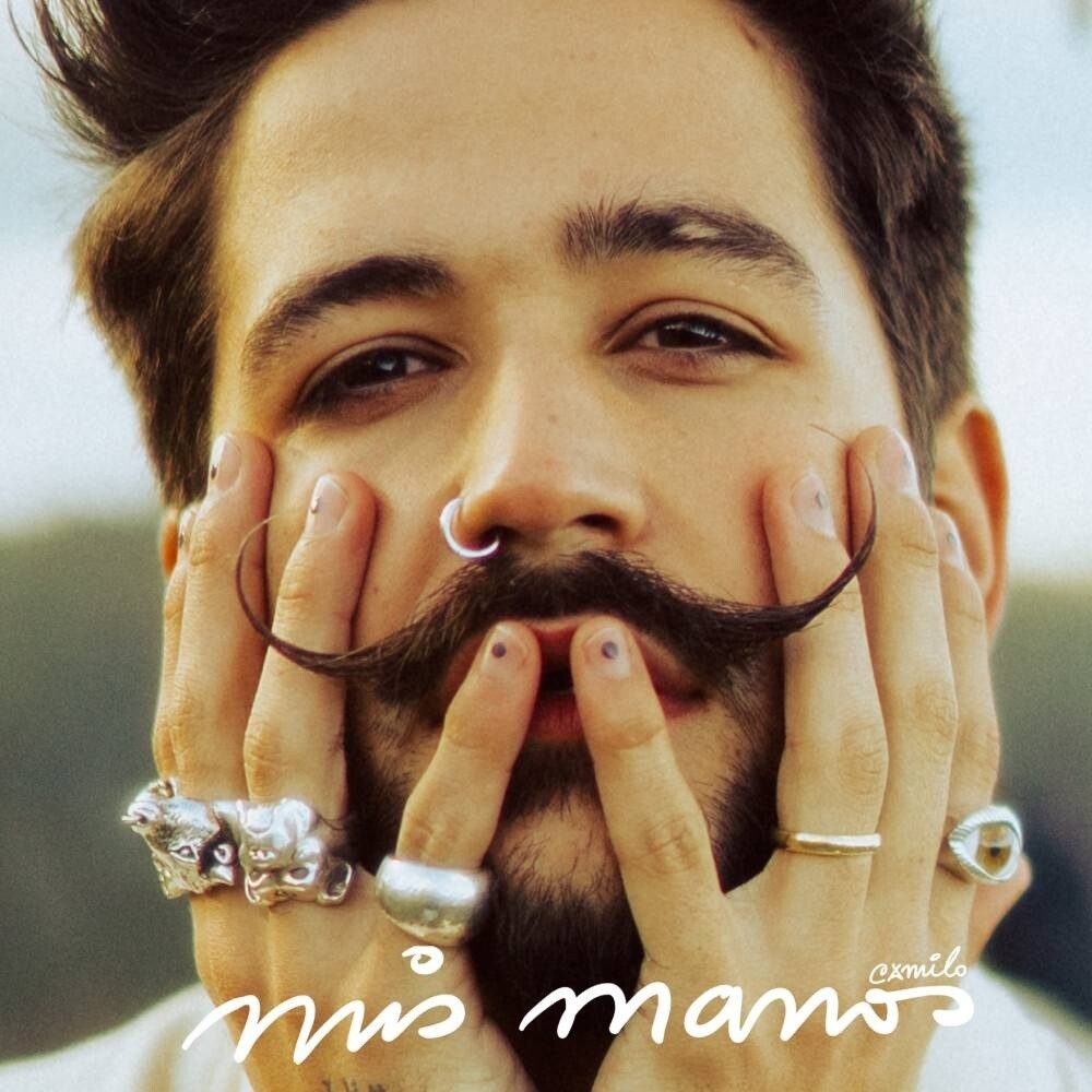 the album cover for Camilo - Mis Manos (Spa)