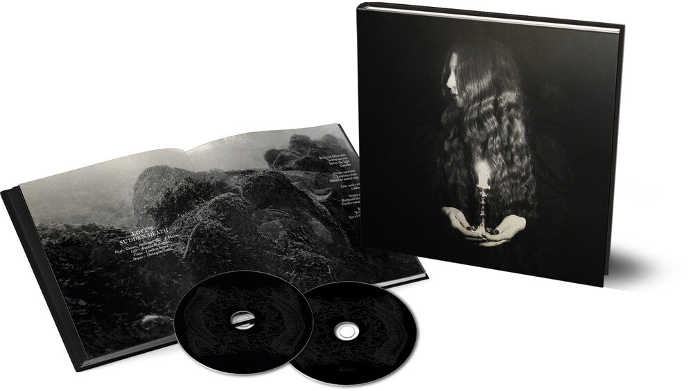 the album cover for Darkher - Buried Storm (2cd Book Edition)