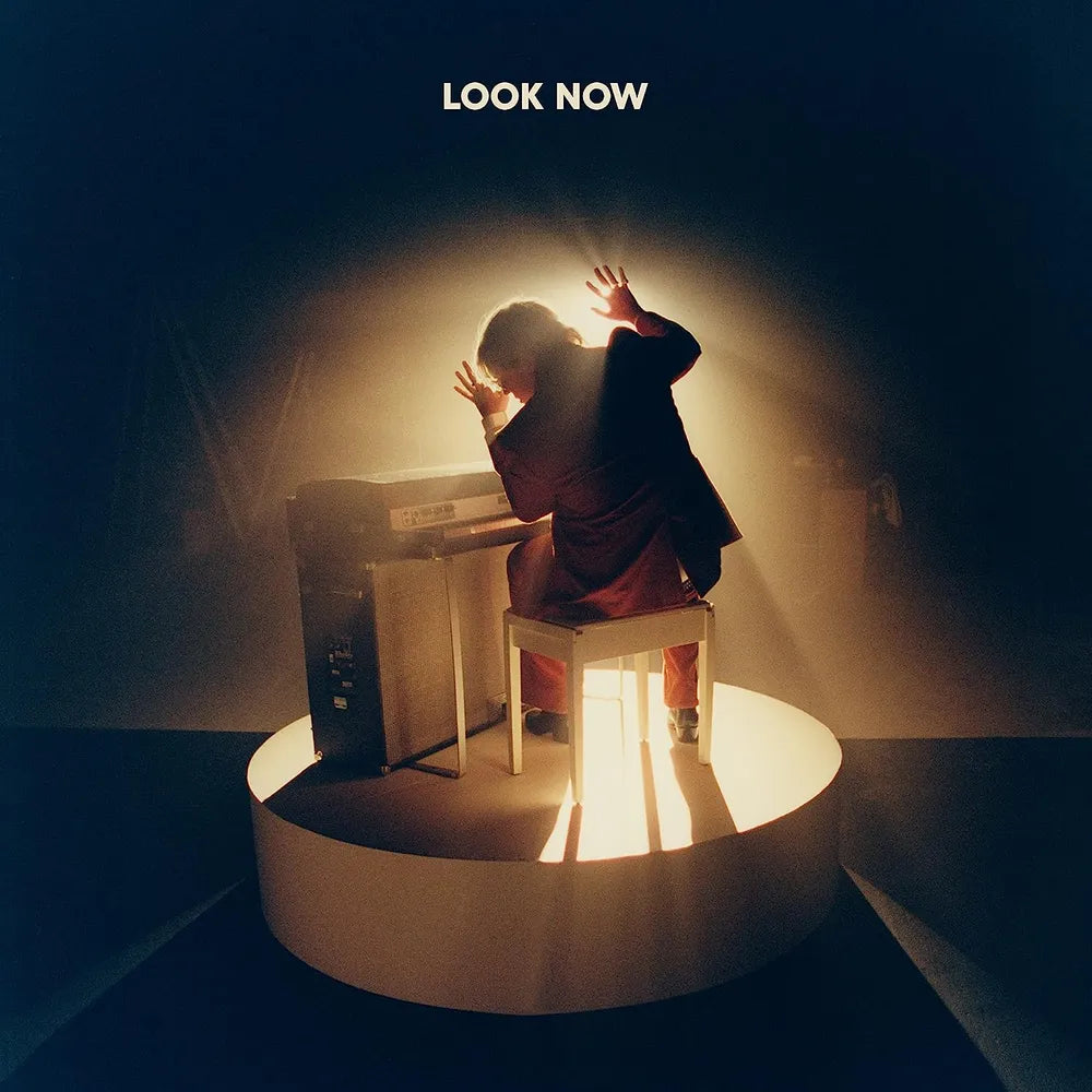 the album cover for Oscar Lang - Look Now
