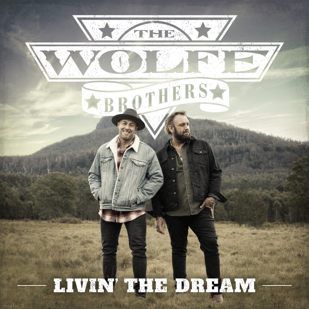 the album cover for Wolfe Brothers - Livin The Dream