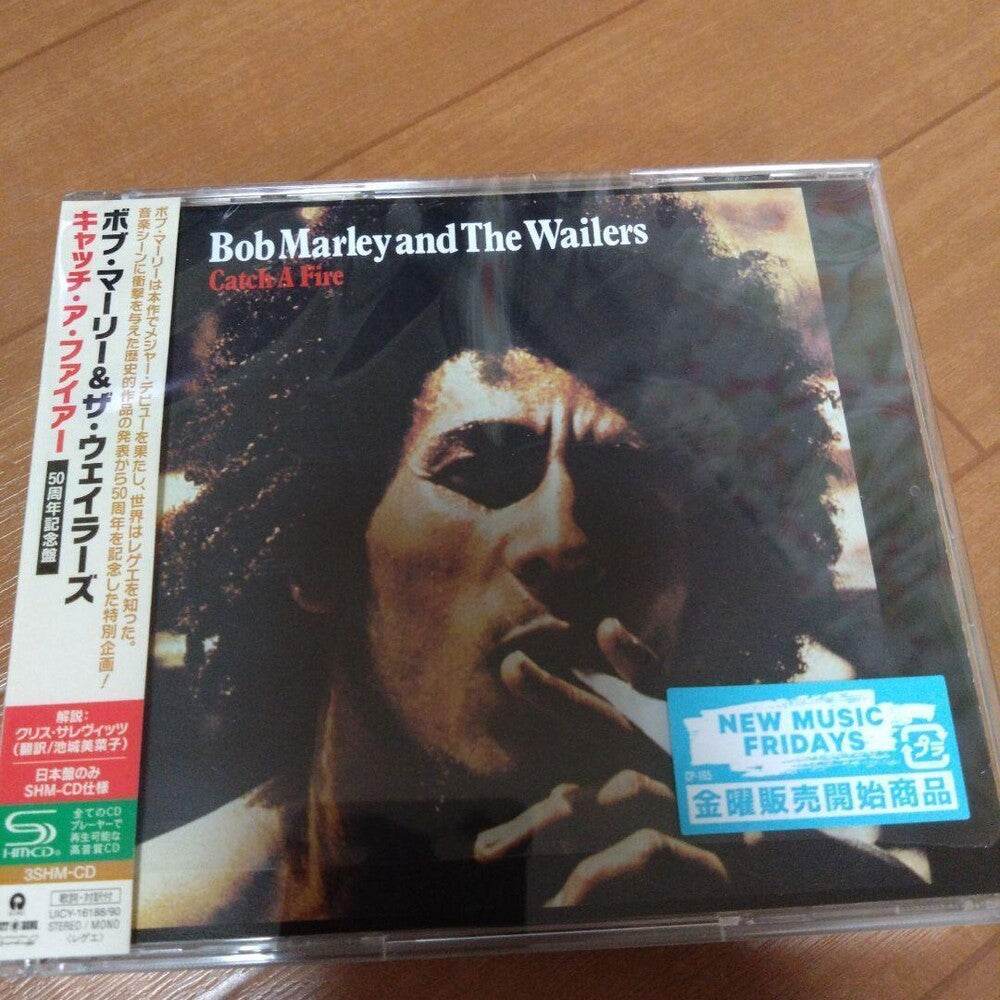 the album cover for Bob Marley & The Wailers - Catch A Fire: 50th Anniversary (Shm) (Jpn)