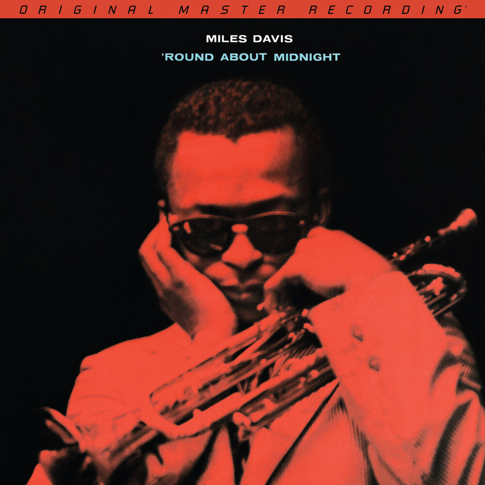 the album cover for Miles Davis - 'Round About Midnight