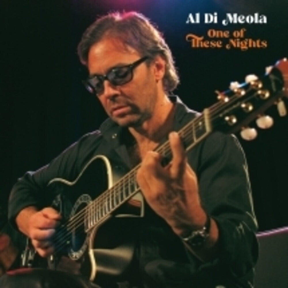 the album cover for Al Di'meola - One Of These Nights