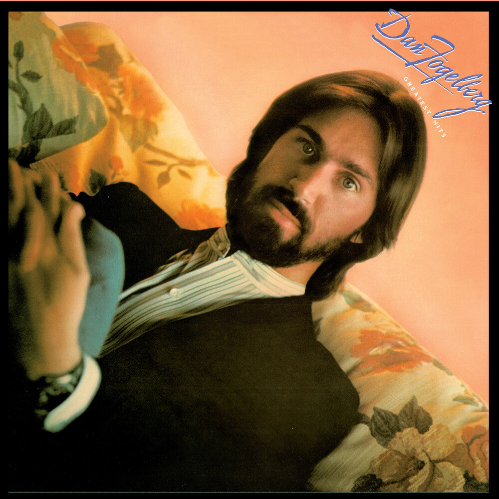 the album cover for Dan Fogelberg - Greatest Hits