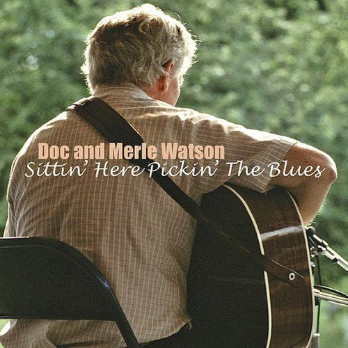 the album cover for Doc Watson & Merle Watson - Sittin Here Pickin the Blues