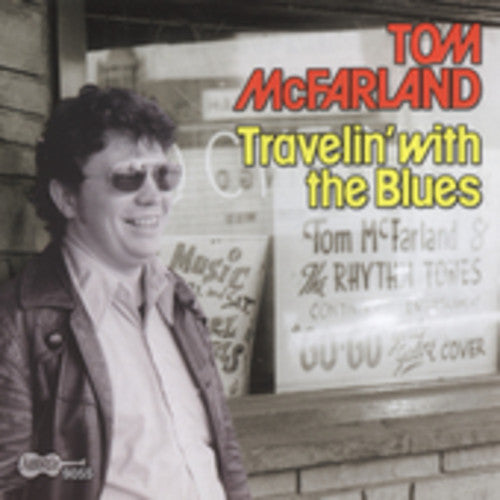 the album cover for Tom Mcfarland - Travelin with the Blues