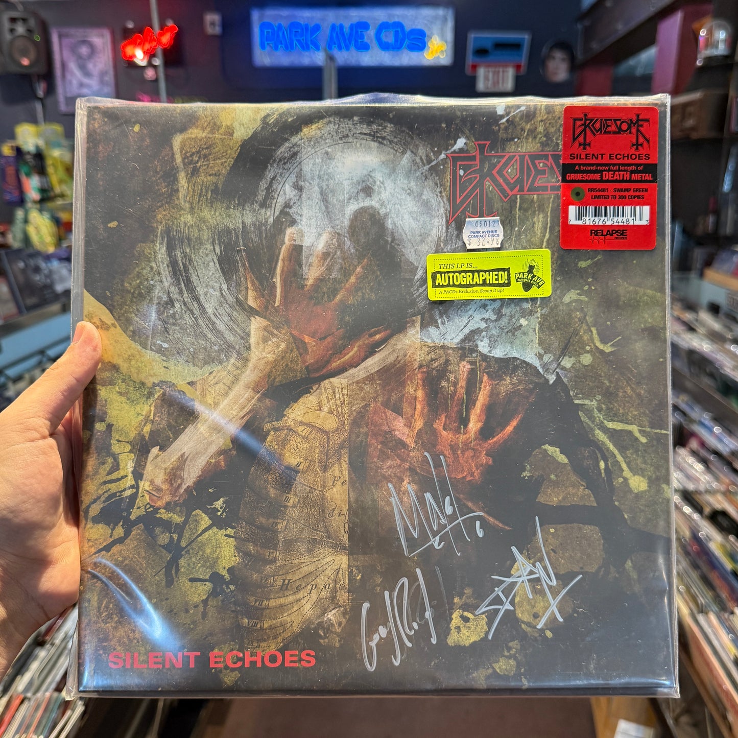 Signed copy of Gruesome - Silent Echoes on Swamp Green vinyl