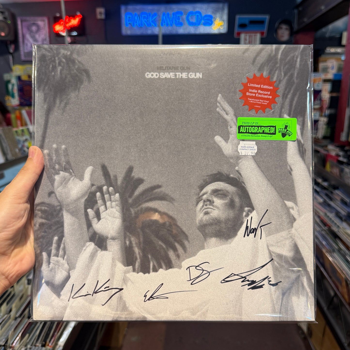 Signed cover for Militarie Gun 'God Save The Gun' Indie Translucent Red LP