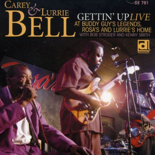 the album cover for Carey Bell - Gettin Up: Live At Buddy Guy's Legends Rosa's