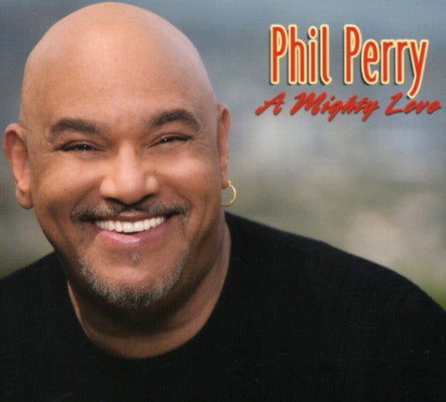 the album cover for Phil Perry - A Mighty Love