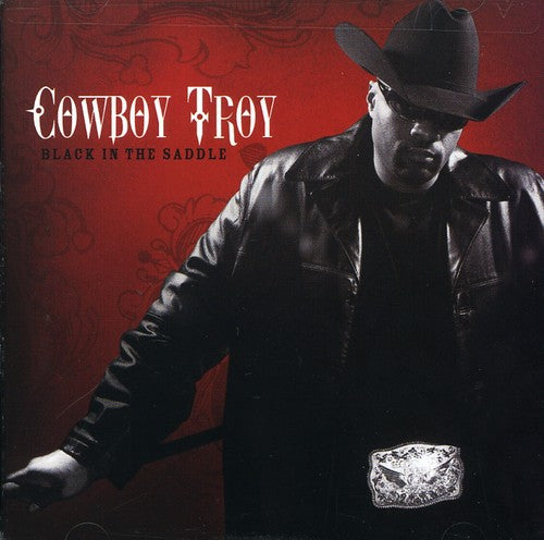 the album cover for Cowboy Troy - Black in the Saddle