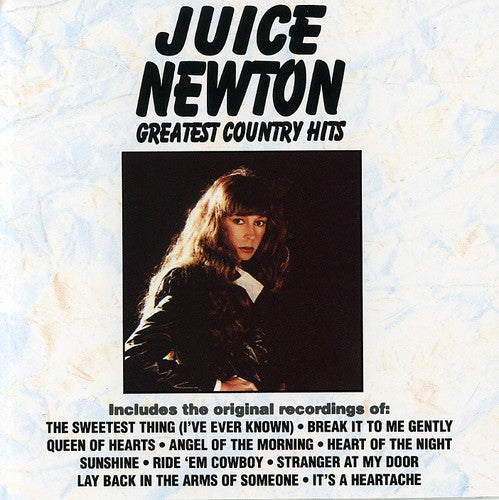 the album cover for Juice Newton - Greatest Country Hits