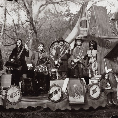 the album cover for The Raconteurs - Consolers Of The Lonely