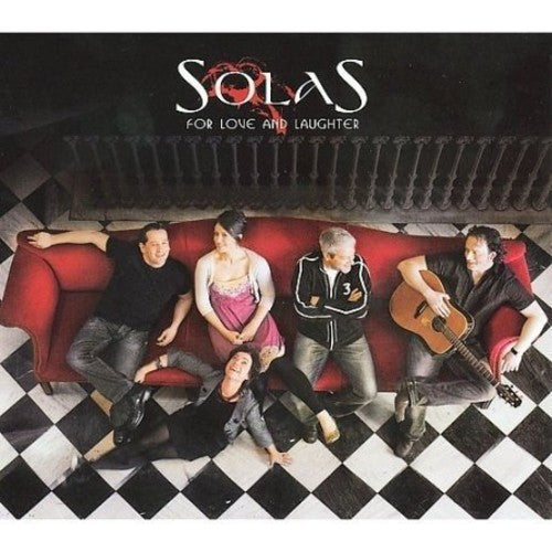 the album cover for Solas - For Love and Laughter