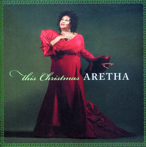 the album cover for Aretha Franklin - This Christmas Aretha