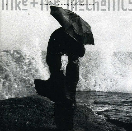 the album cover for Mike + The Mechanics - Living Years