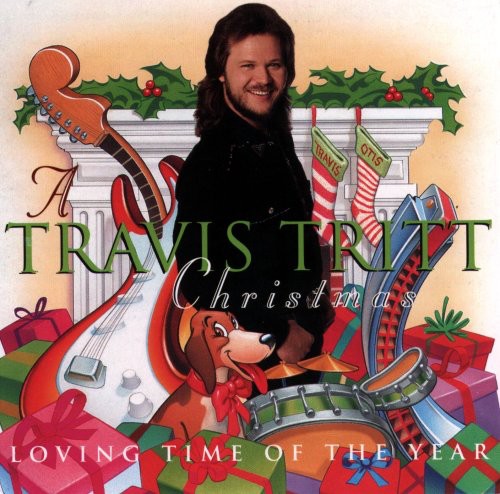 the album cover for Travis Tritt - Tritt Xmas
