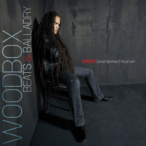 the album cover for Daniel Roumain Bernard - Woodbox Beats and Balladry