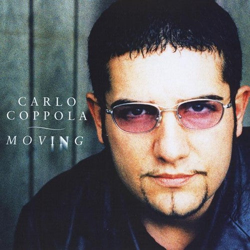 the album cover for Carlo Coppola - Moving in