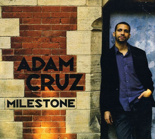 the album cover for Adam Cruz - Milestone