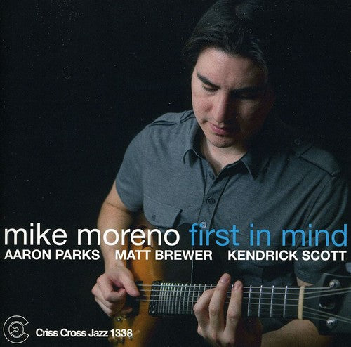 the album cover for Aaron Parks - First in Mind