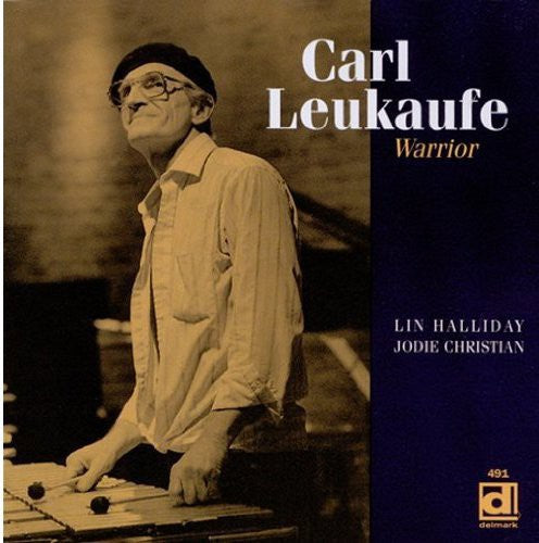 the album cover for Carl Leukaufe - Warrior