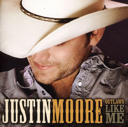 the album cover for Justin Moore - Outlaws Like Me