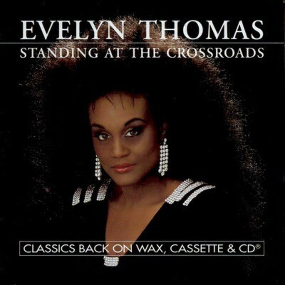 the album cover for Evelyn Thomas - Standing at the Crossroads