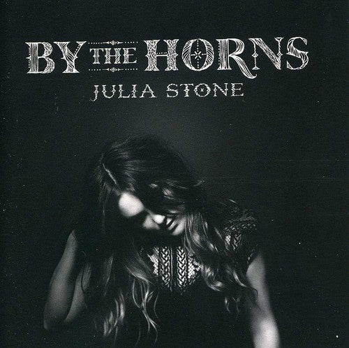 the album cover for Julia Stone - By The Horns