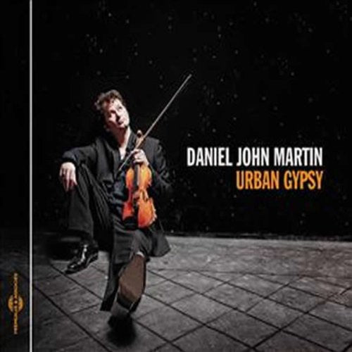 the album cover for Daniel Martin John - Urban Gypsy