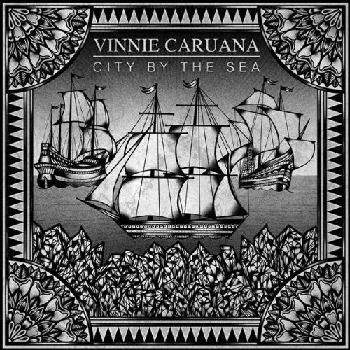 the album cover for Vinnie Caruana - City By The Sea [Color + Etched]