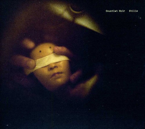 the album cover for Gauntlet Hair - Stills