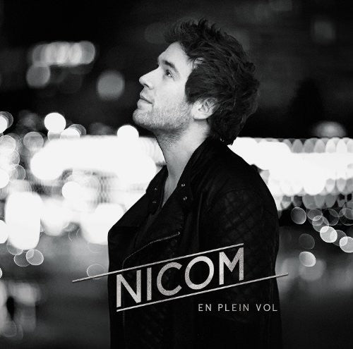 the album cover for Nicom - En Plein Vol