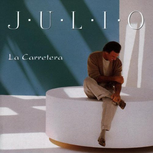 the album cover for Julio Iglesias - La Carretera