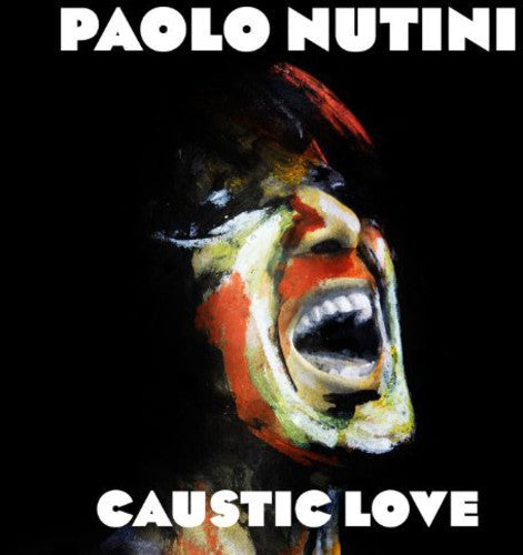 the album cover for Paolo Nutini - Caustic Love [Import Vinyl]