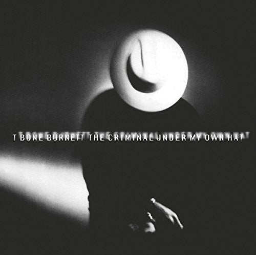 the album cover for T Bone Burnett - Criminal Under My Own Hat [Import]